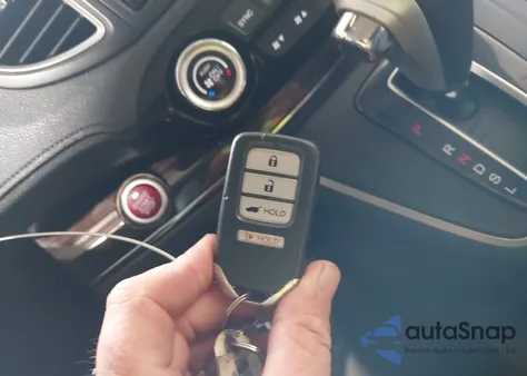 2015 Honda Cr-V Touring z USA, uszkodzony, nr VIN 5J6RM4H91FL120929